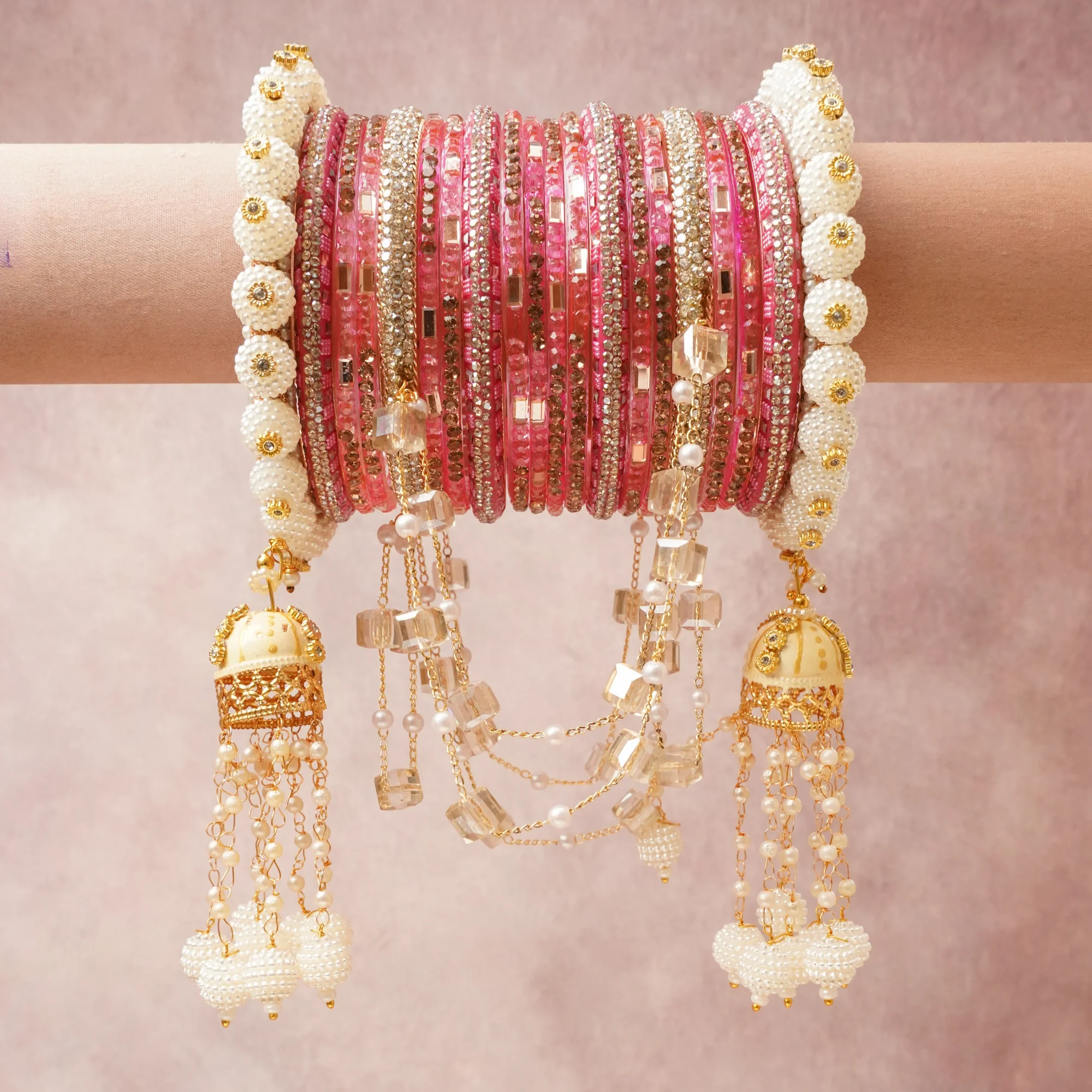 A majestic Fuchsia set, complemented by Clear featuring Glass, Acrylic, Gold-Toned Metal, Faux Pearls, Rhinestones, Enamel.
Rich, ceremonial, and designed to be passed through generations.